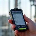 Engineer using mobile network diagnostics tool